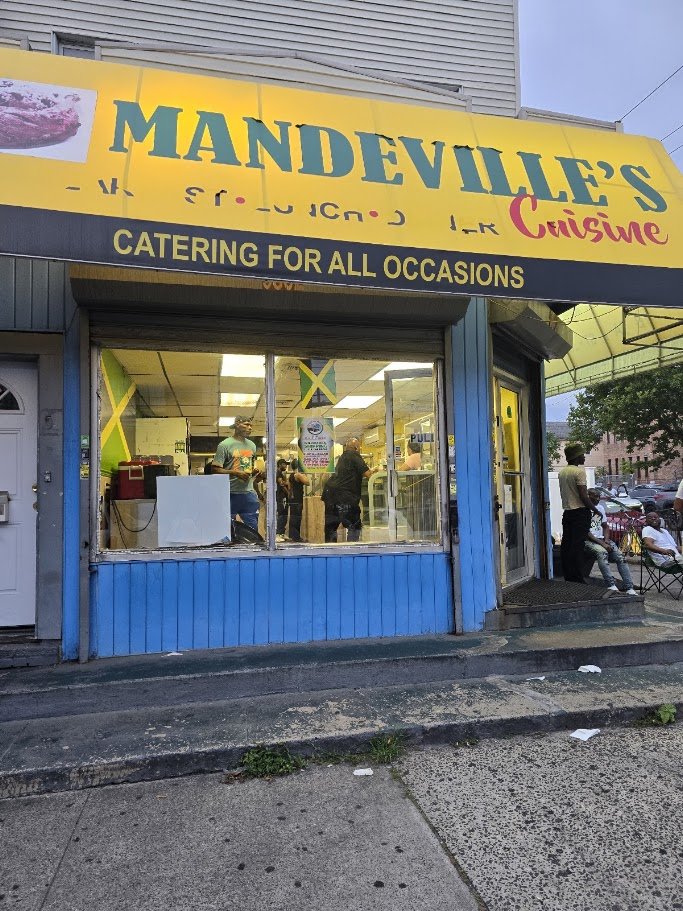 Jamaican restaurant storefront on Foster Avenue.